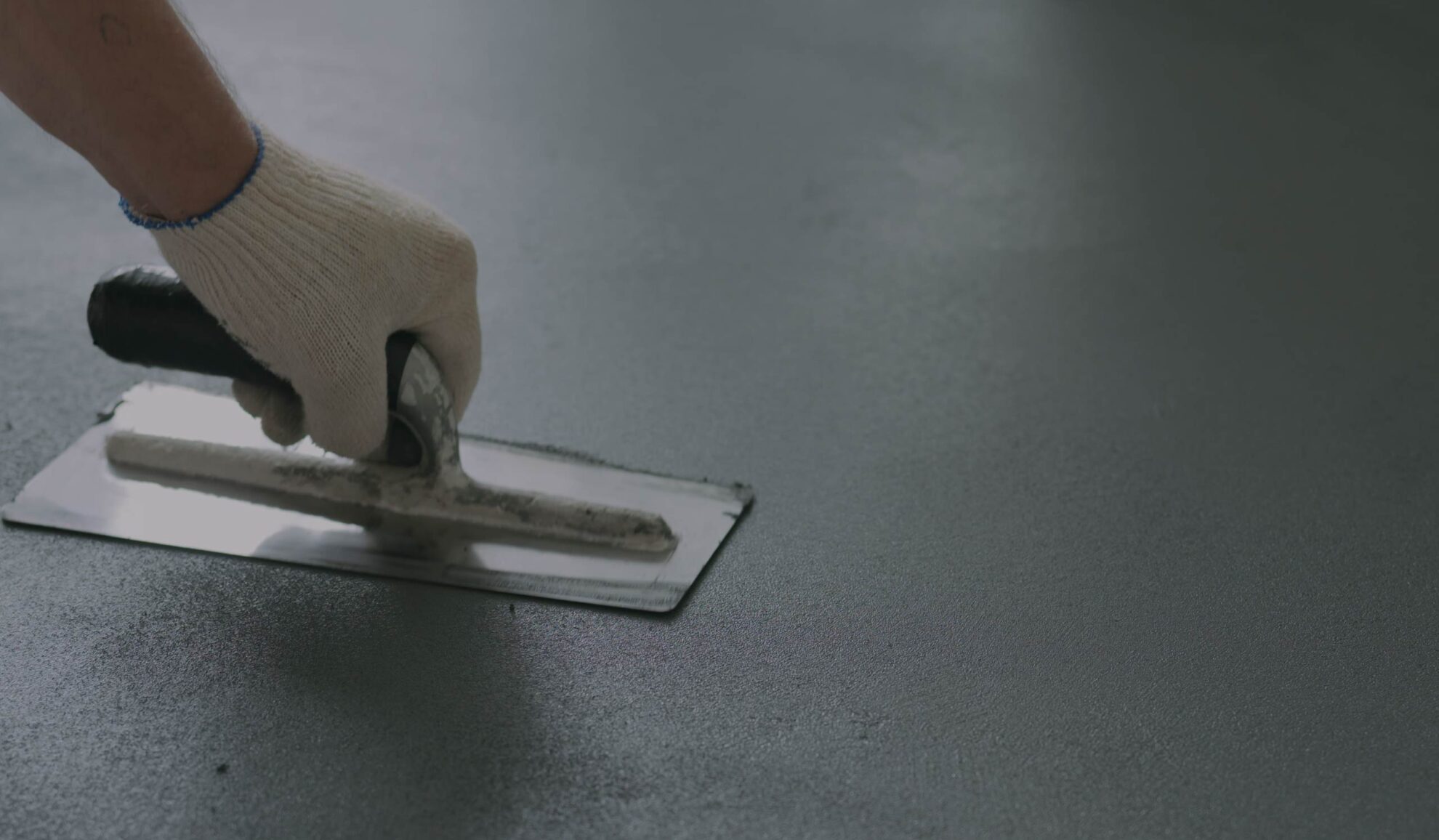 man applying concrete